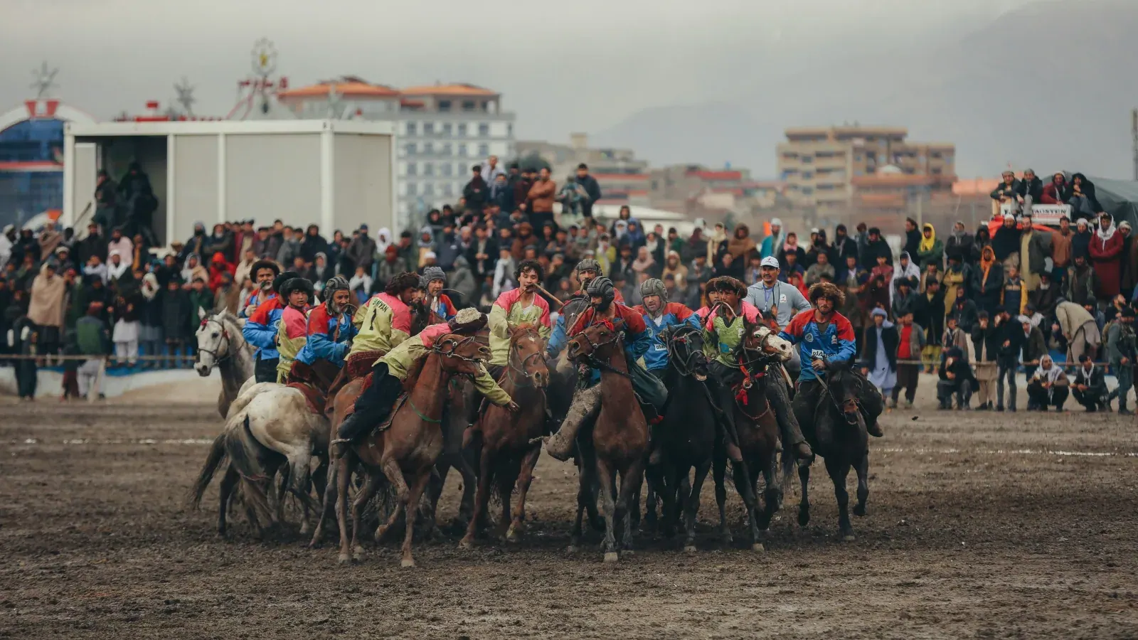 A buzkashi match on the open plain